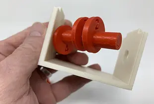 "Lora and I", a Simple 3D Printed Automaton.