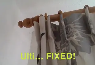 Wall mounted drape holder