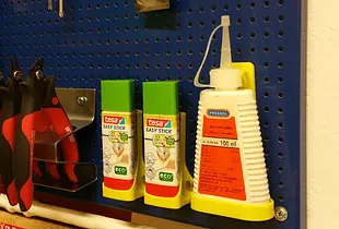 Holder for sewing machine oil bottle