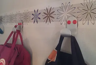 Wall hook for backpacks